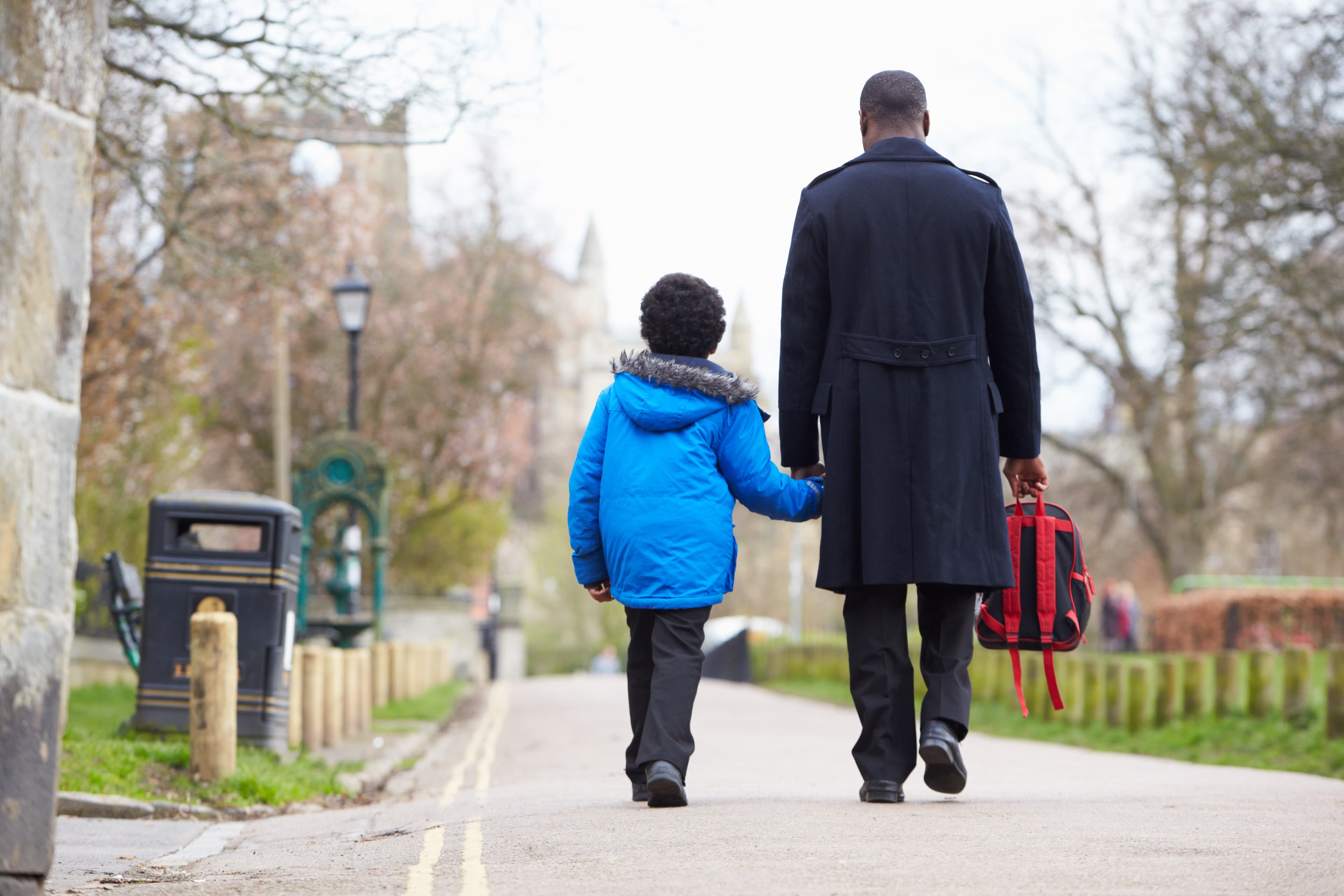Dad and son walking