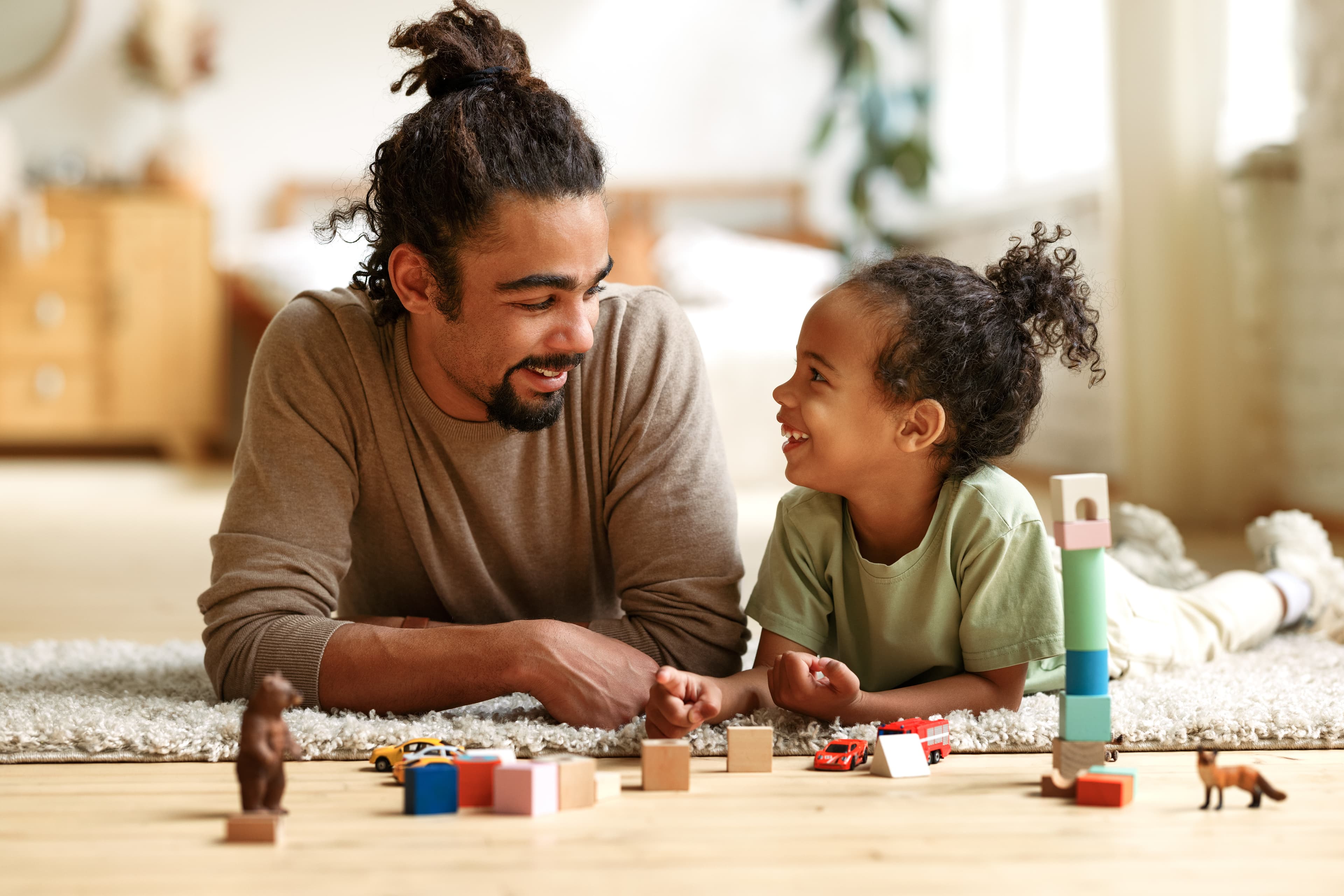 Father and daughter working together without threats.