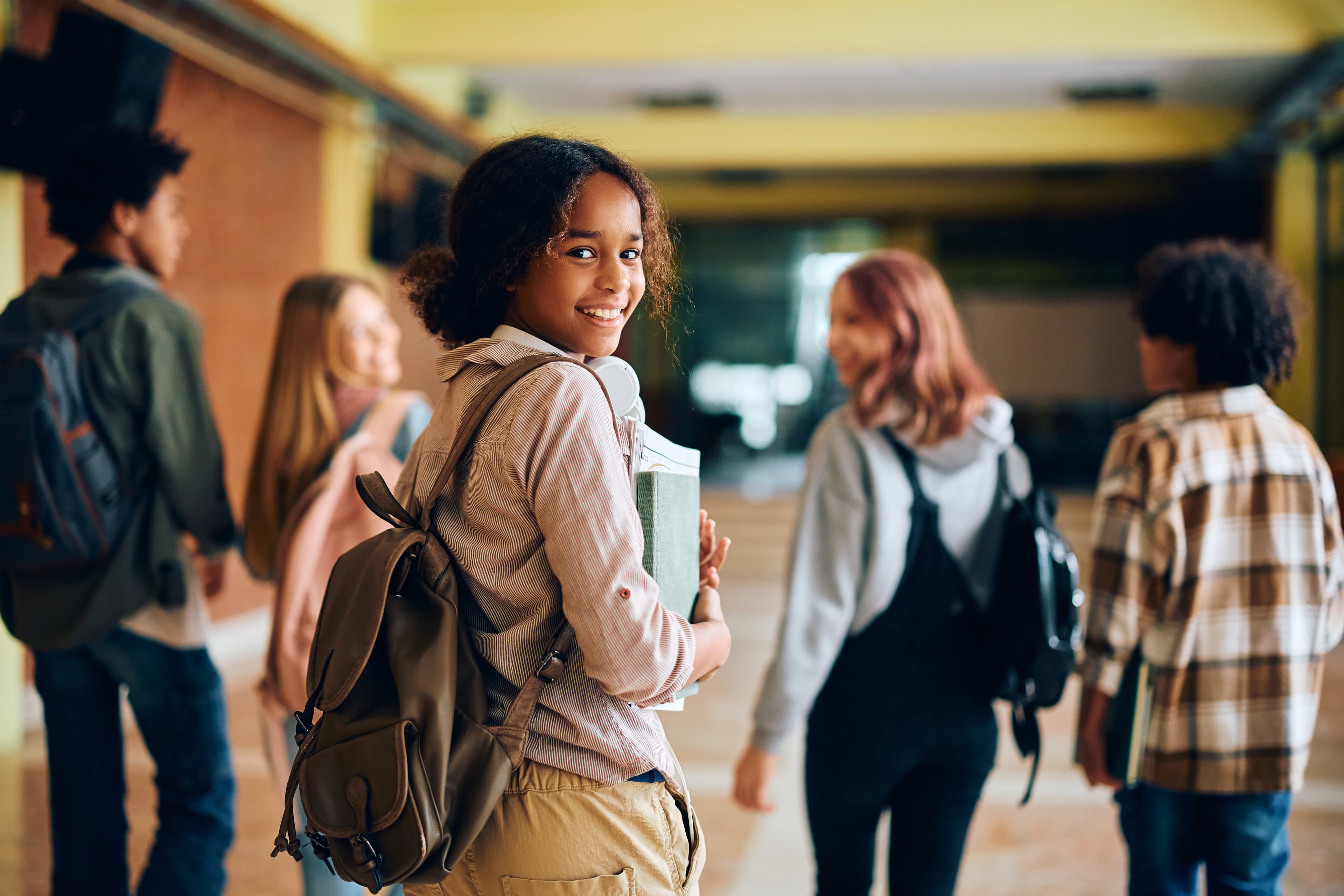Child walking through halls of the school.